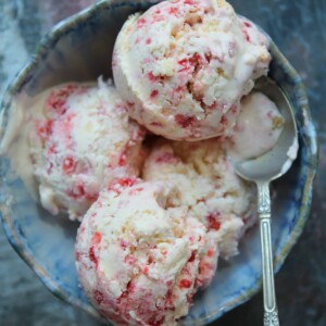 A bowl of strawberry cheesecake ice cream.