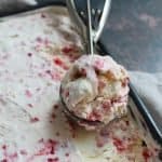 a scoop of strawberry cheesecake ice cream.