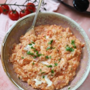 A bowl of tomato and mascarpone risotto.