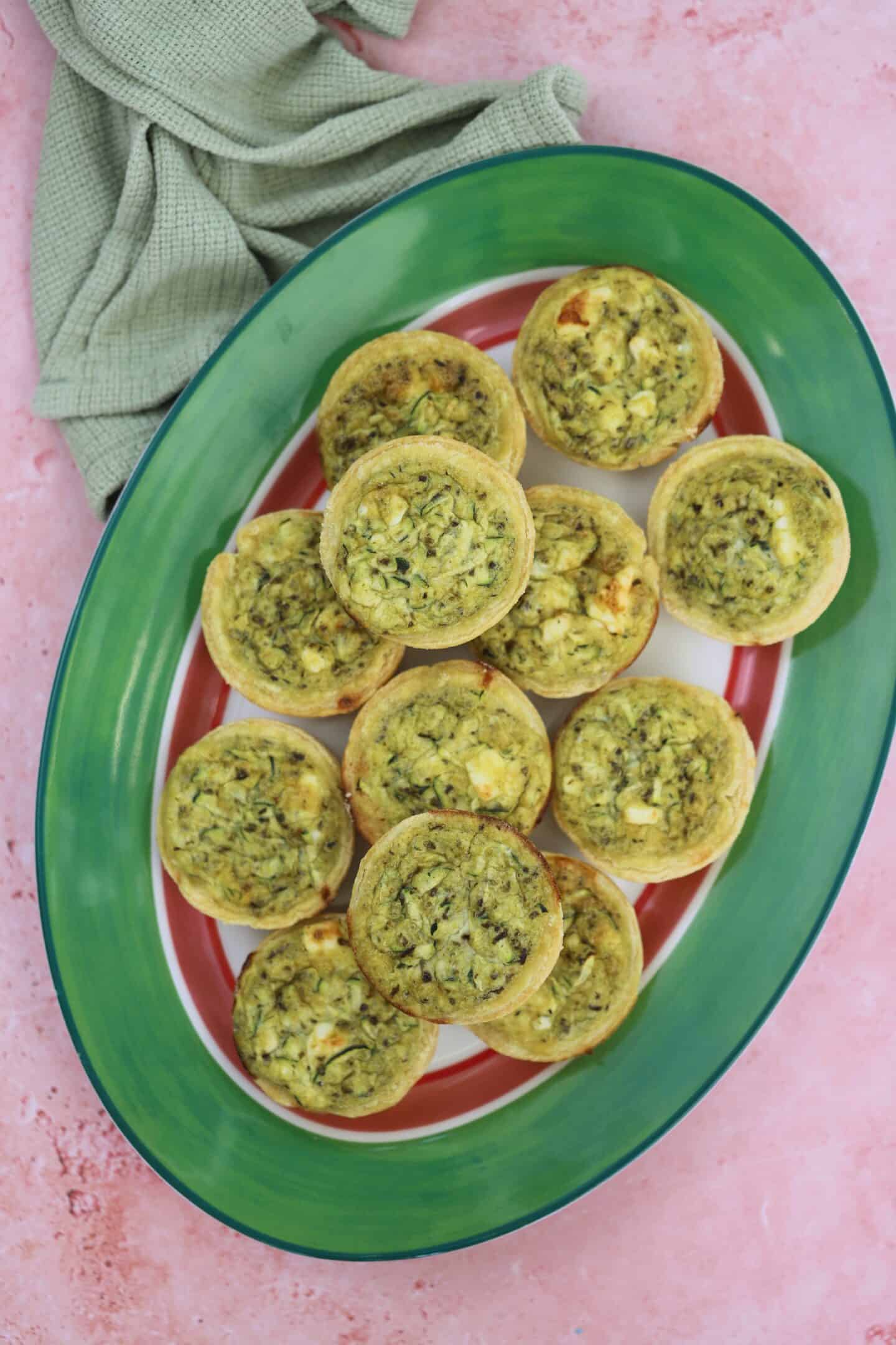 A plate of gluten free mini quiches.