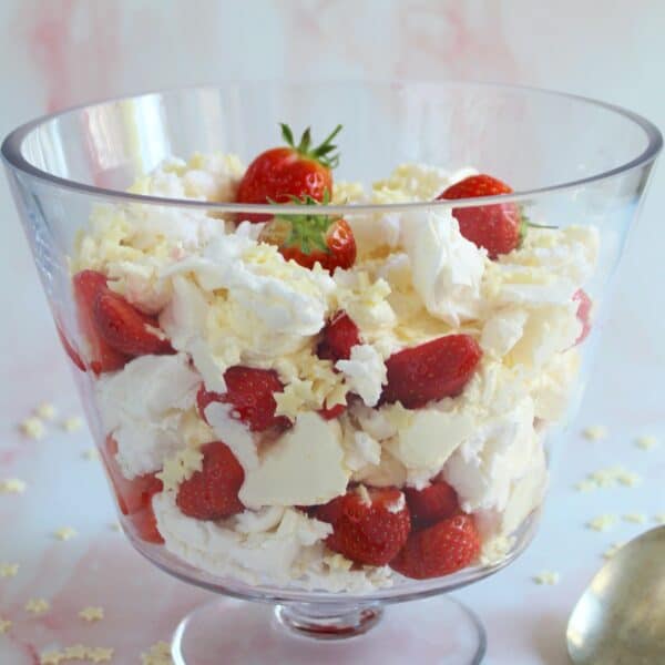 A large glass dish filled with Eton Mess.