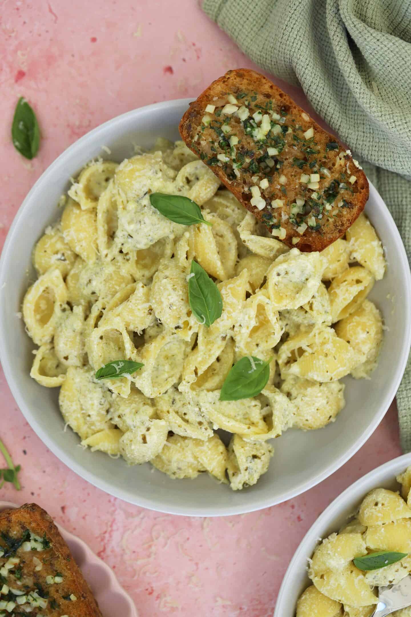 A bowl of pesto and ricotta pasta.