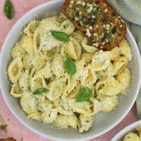 A bowl of pesto and ricotta pasta.