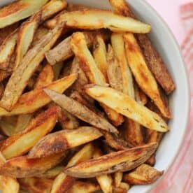 A bowl of homemade oven chips.