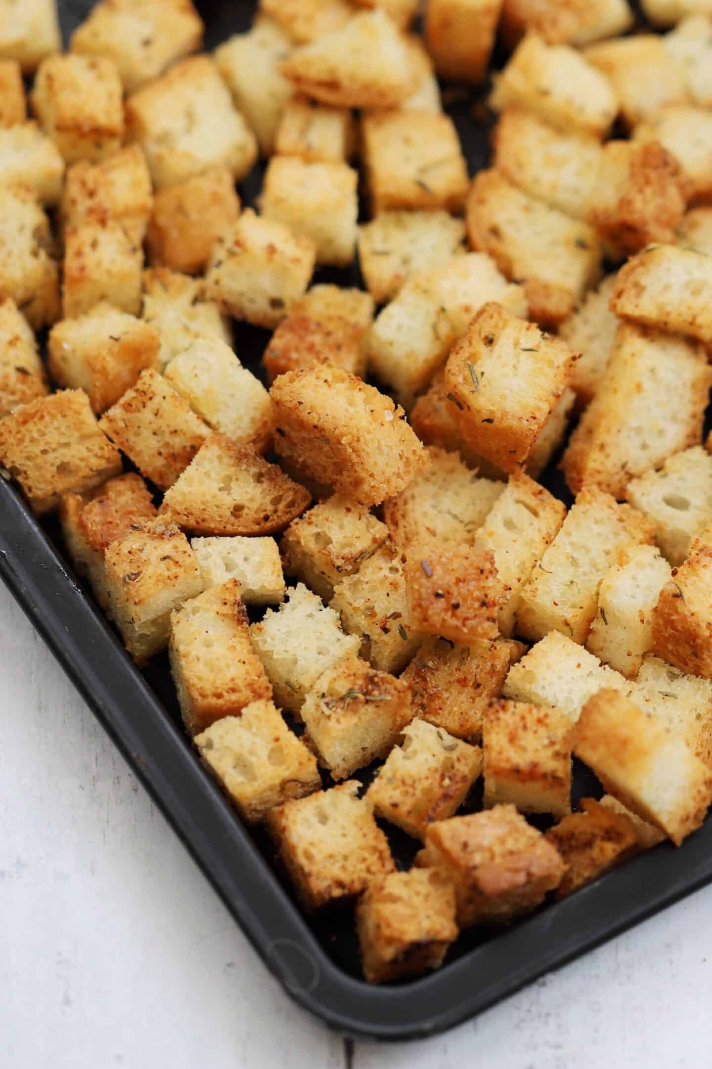 A tray of gluten free homemade croutons.