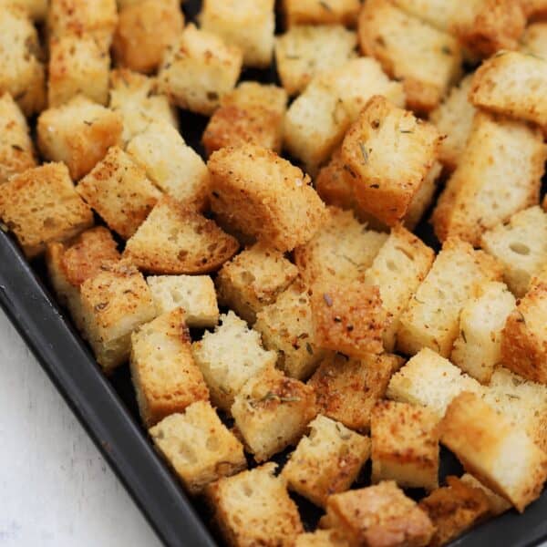 A tray of gluten free homemade croutons.