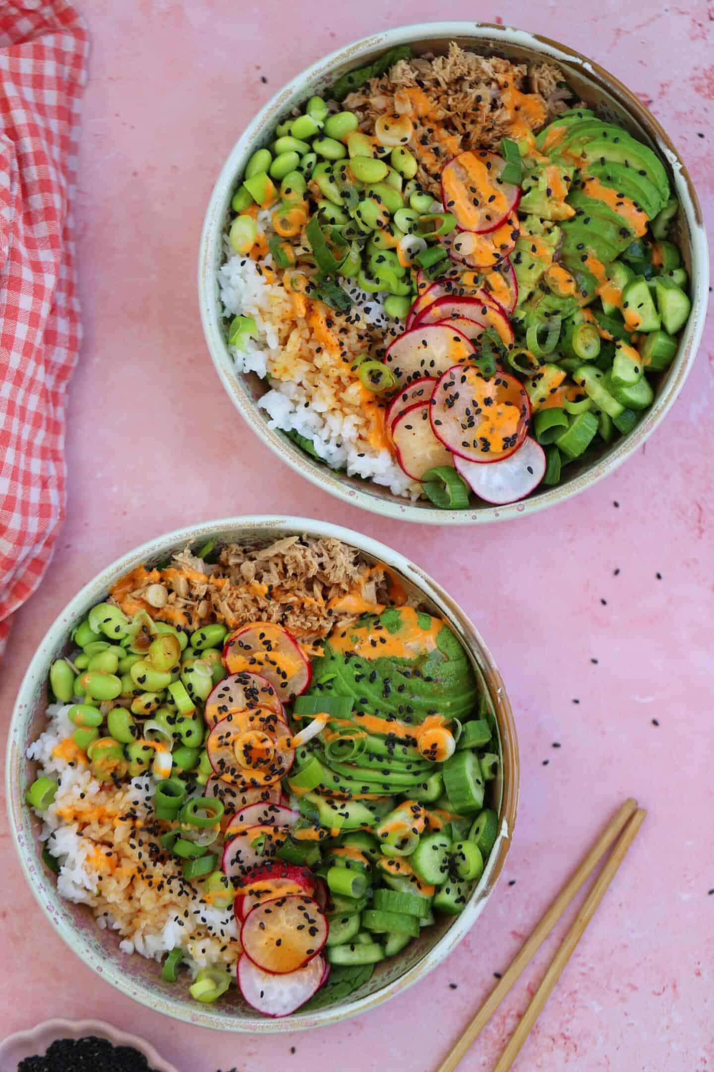 Two spicy tuna sushi bowls.