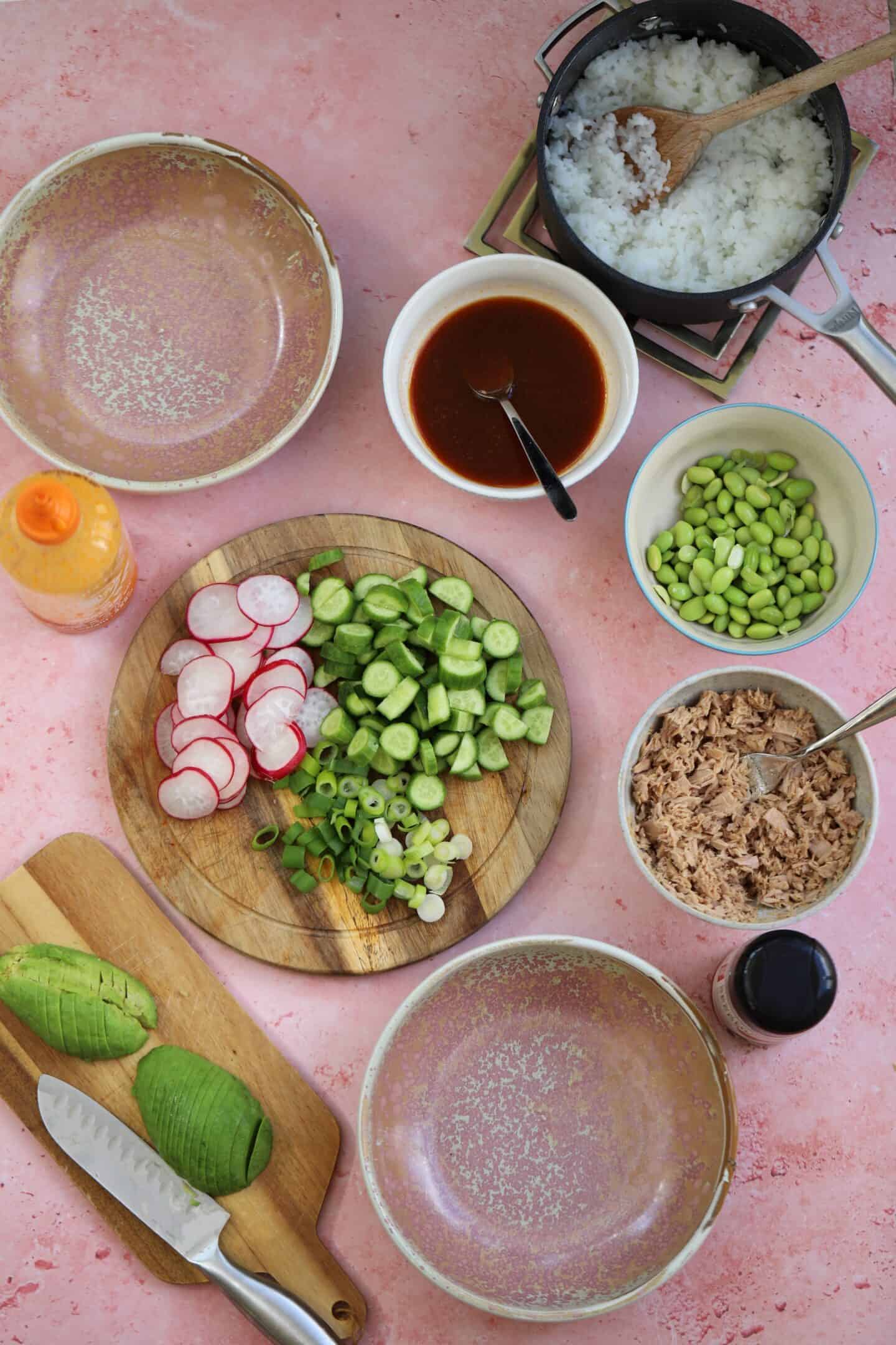 Flat lay of ingredients for a gluten free tuna sushi bowl. 