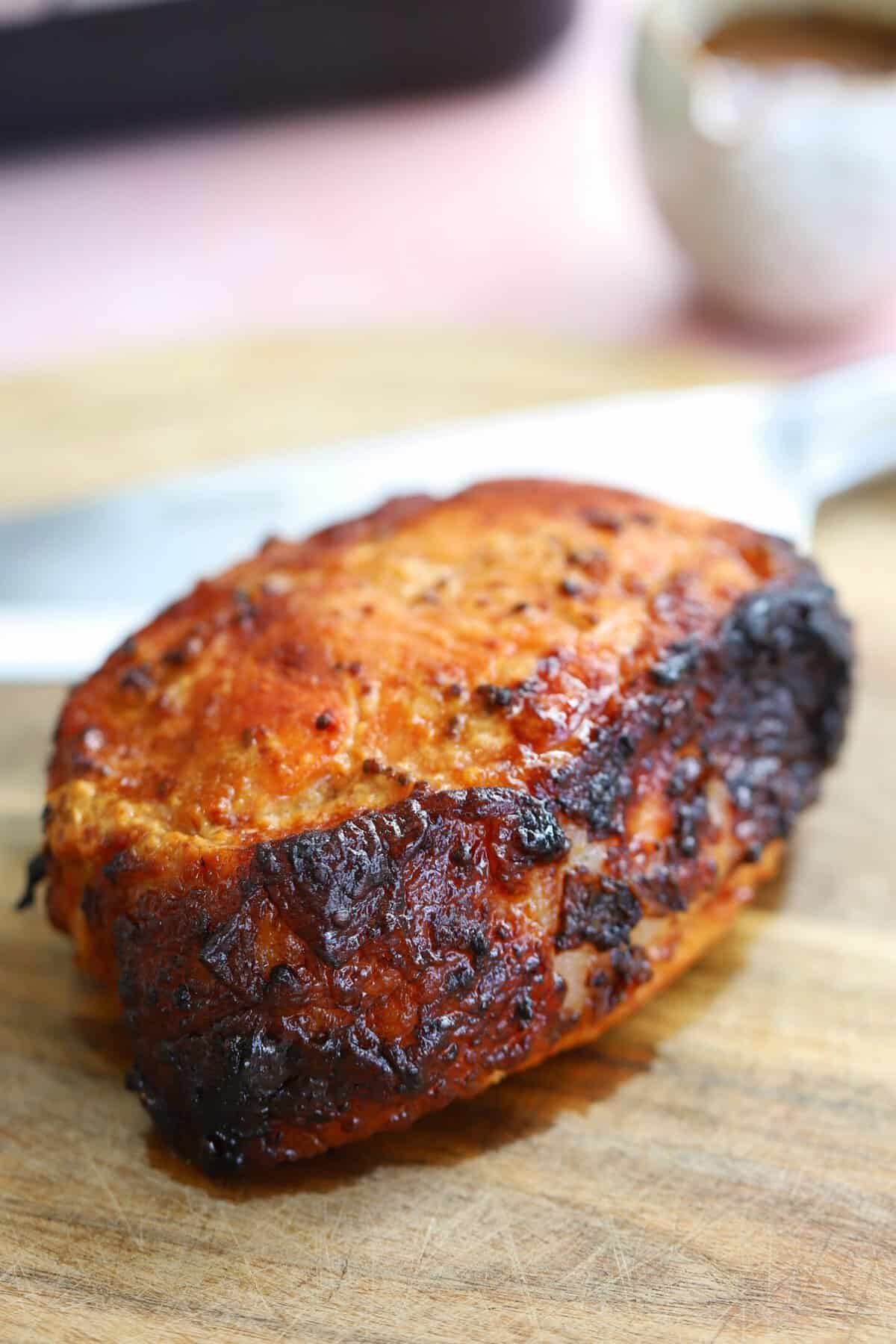 An air fryer ham joint with honey and mustard glaze.