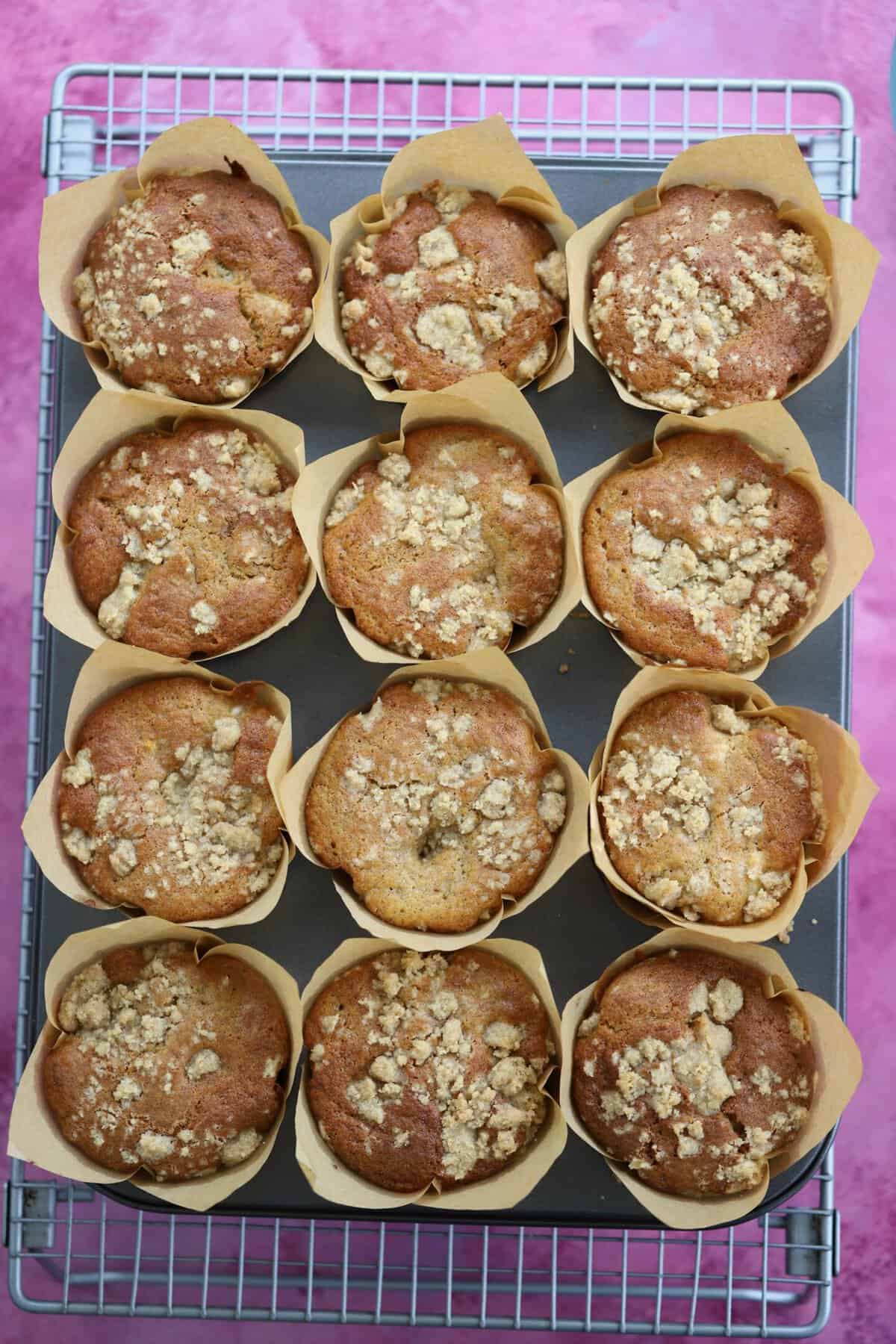 A tray of gluten free apple muffins fresh from the oven.