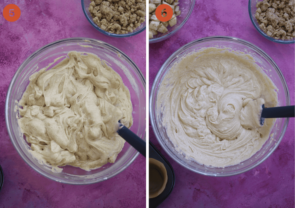 The apple muffin batter with the apple chunks folded in, in a mixing bowl.