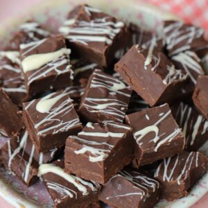 A plate of squares of slow cooker chocolate fudge.