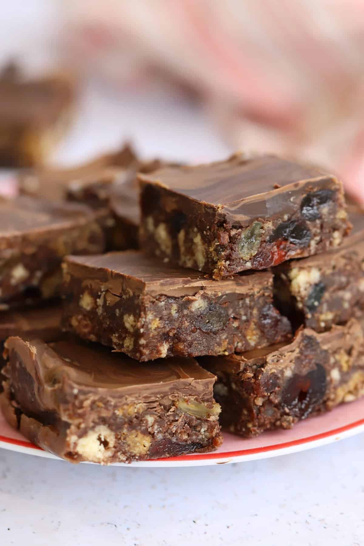 A plate of gluten free chocolate tiffin squares.